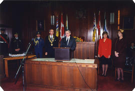 Mayor Philip Owen, Roméo LeBlanc, Brita Owen and Diana Fowler LeBlanc in council chambers