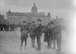 Military officers standing in groups