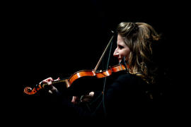 Day 25 Community Celebration performer plays the fiddle in Moncton, New Brunswick.