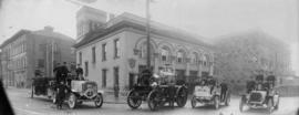 [Group portrait of Firefighters and apparatus in front of Firehall #1]