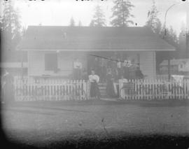 [Women's field hockey team standing in front of Vancouver Cricket Club building]