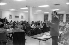 Mike Harcourt speaking at multicultural meeting