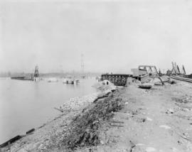 Stage of construction just prior to placing first steel span between piers 4 and 5 at south end o...