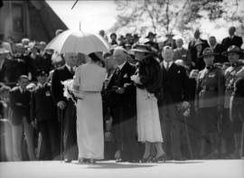 [Queen Elizabeth speaking to Premier T.D. Pattullo and Prime Minister William Lyon Mackenzie King]