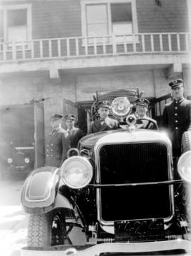 [Firefighters beside Studebaker C.S.T. in front of South Vancouver firehall]