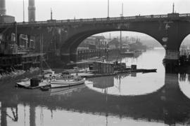 [Boats and barge under the Georgia Viaduct]