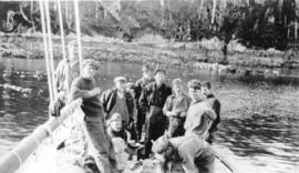 [Fishermen on board Captain Henry Peterson's "Cape Scott II" behind Table Island]