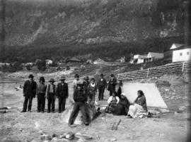 [Group of Indians on river bank, possibly at Yale, B.C.]