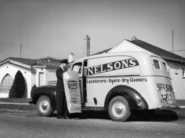 Nelson's Launderers & Dry Cleaners delivery man and delivery truck