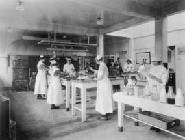 Interior of kitchen at Vancouver General Hospital showing staff