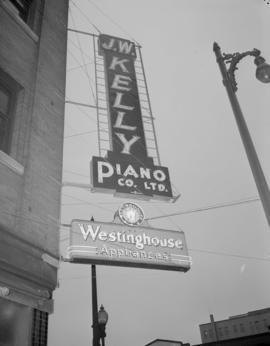 Neon Products - Westinghouse sign on Kelly Piano Co.