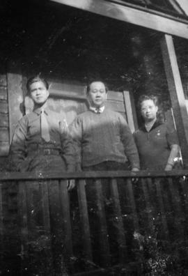Donald Wong with two unidentified men
