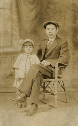 Unidentified man with female child
