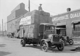 Standard Transfer [Co. truck of 733 Helmcken] carting hay from Mc & Mc[Carter]