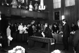 Mace being carried out of City Council Chambers followed by Mr. Justice Branca and Mayor Art Phil...