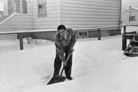 Man shoveling snow