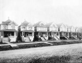 [New houses on the east side of Burrard Street between Georgia Street and Robson Street]