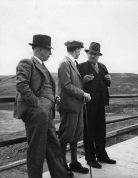 B. Russell, Lord Tweedsmuir and John Vallance at the Val Marie Dam