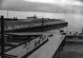 [King George VI and Queen Elizabeth motorcade leaving C.P.R. Station]