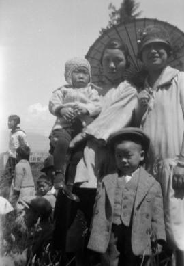 Lillian Wong with friend and children