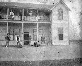 [Lacrosse players in front of the club house at Brockton Point]