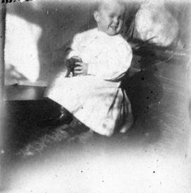 [Theodore Taylor holding toy]