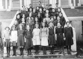 [A class on the steps of Edith Clavell School at the corner of Tupper Street and 20th Avenue]