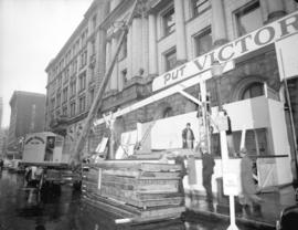 Taking down Bond Shell [outside the Main Post Office]