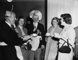 P.N.E. director and P.N.E. Advisory Director C.N. Oldfield in maid costumes at tea party