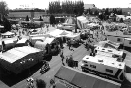 Booths, tents, and trailers on P.N.E. grounds by Garden building