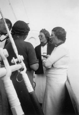 Eric W. and Aldyen Hamber with two women aboard the Vencedor