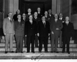 Charles E. Thompson with unidentified group of men