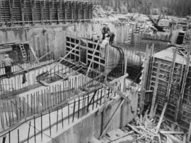 View from axis of old Seymour Falls Dam showing intake structure and form work for transitions