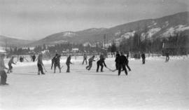 [Playing hockey in an internment camp]