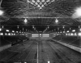 Installation of pipes for ice surface in Forum building on Vancouver Exhibition grounds