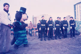 Tillicum with youth in uniform on beach at Polar Bear Swim