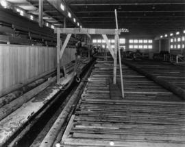 Installation of pipes for ice surface in Forum building on Vancouver Exhibition grounds