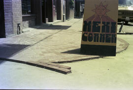 [Street construction and sign for Mexi Corner at 199 Water Street]