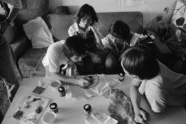 Jim Wong-Chu leading a silk-screening session for Pender Guy