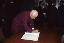 City Hall; Visit of Bishop of Canterbury; [Archbishop of Canterbury] Bishop signs book.
