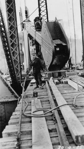 Men working on bascule counterweight system : April 30, 1925