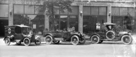 [Begg Motor Co. Service Trucks in front of Begg Motors Ltd. Building]