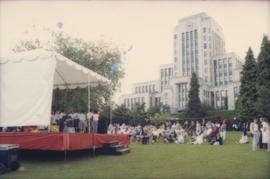 Crowd looking towards Chevron Stage with City Hall in the background