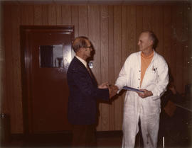 Retiring personnel: William (Bill) Miller with William Murdoch (Superintendent)