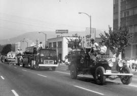 [View of Fire Department floats and vehicles in Pacific National Exhibition parade]