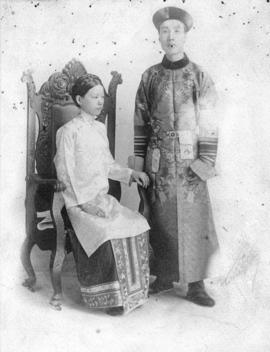 [Portrait of man and woman wearing traditional Chinese clothing]