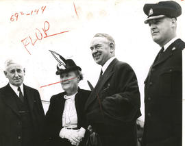 Mayor Gerald McGeer with Charlotte McGeer, Alderman Miller, and Police Chief Walter Mulligan