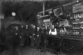 [Interior of a bar room]