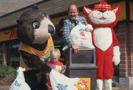 Tillicum and MacTavish with a child and Mayor Harcourt