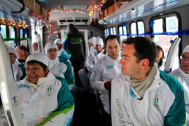 Day 42 Torchbearers waiting for their drop-off points on the Torchbearer Shuttle in Saint-Eustach...